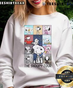 Alt Text: Cozy The Snoopy Tour Taylor Eras Tour sweatshirt featuring vibrant graphics and a stylish design for fans.