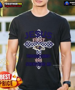 Top Baltimore Ravens 'Jesus First Through Christ Who Strengthens Me' T-Shirt featuring team colors and inspirational design.
