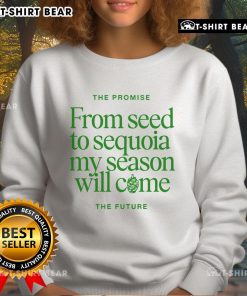 Top view of the 'Promise From Seed To Sequoia' sweatshirt by Benjamin William Hastings, featuring a bold design.