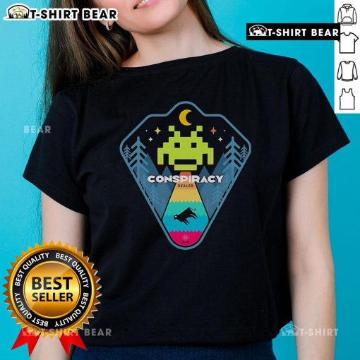 Top Conspiracy Dealer Retro Games Ladies Tee featuring vibrant graphics and a stylish fit for gamers and enthusiasts.
