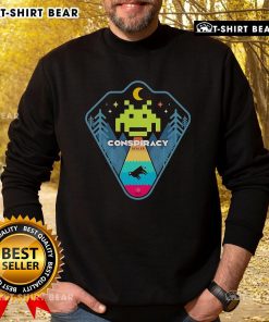 Top Conspiracy Dealer Retro Games Sweatshirt featuring vibrant graphics and a cozy fit for gaming enthusiasts.