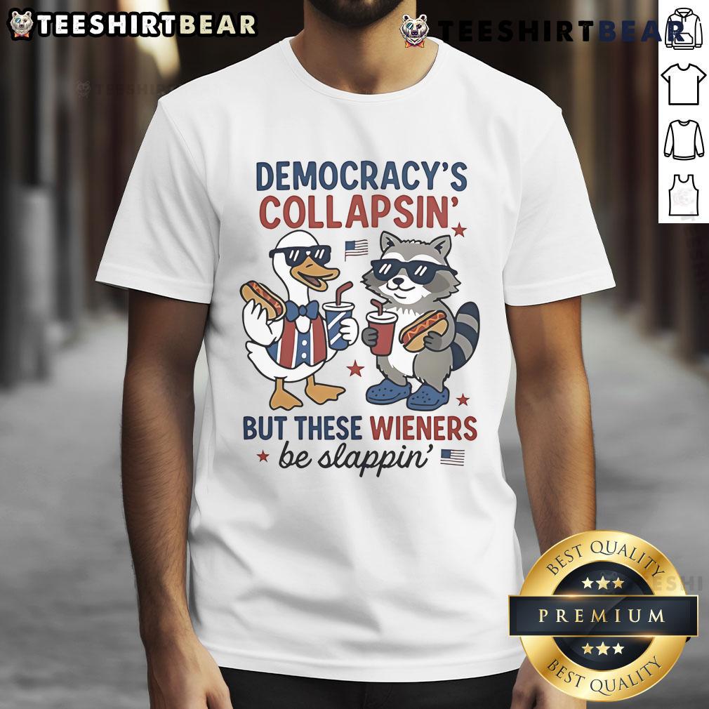 Top Duck And Racoon Democrat Fourth Of July Shirt Democracys Collapsing But These Wieners Be Slapping T-Shirt Fourth of July shirt featuring a duck and raccoon with text 'Democracy's Collapsing But These Wieners Be Slapping.'