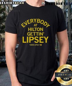 Alt Text: Top Everybody At Hilton Gettin Lipsey T-Shirt worn by a group of friends at a lively event, showcasing vibrant designs.