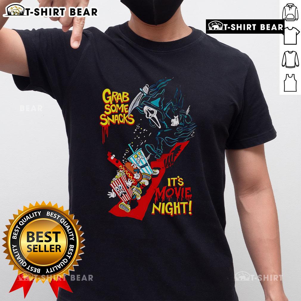 Top Grab Some Snacks It'S Movie Night T Shirt Alt Text: Top Grab Some Snacks It's Movie Night T-Shirt featuring fun design and vibrant colors for movie lovers.