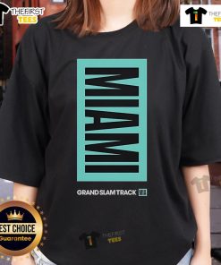 Alt Text: Top Grand Slam Track Miami Ladies Tee in vibrant colors, showcasing stylish design for active women.