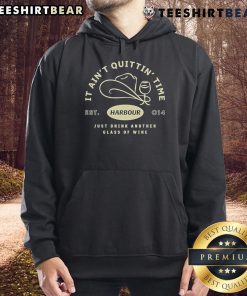 Alt Text: Cozy hoodie featuring the phrase It Ain't Quittin' Time, Just Drink Another Glass of Wine for wine lovers.