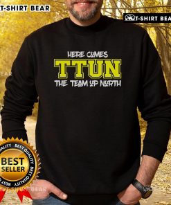 Cozy 'Here Comes Ttun' sweatshirt featuring a northern-themed design, perfect for team spirit and casual wear.