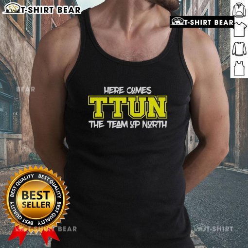 Stylish 'Here Comes Ttun The Team Up North' tank top for fans, featuring bold graphics and a comfortable fit.