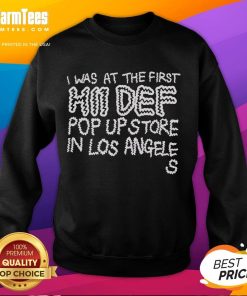 Top I Was At The First Hii Def Pop Up In Los Angeles Sweatshirt worn by a person at the event, showcasing trendy streetwear.