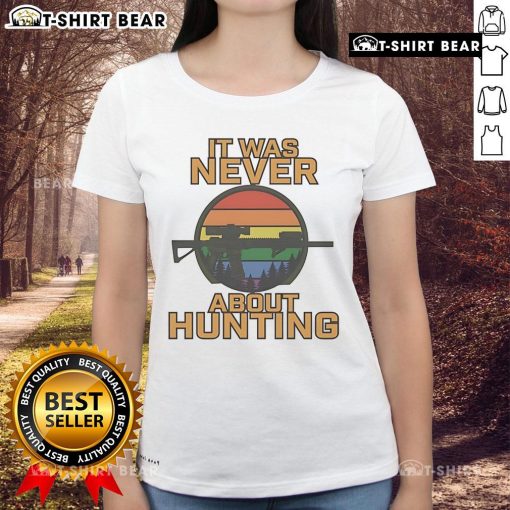 Top It Was Never About Hunting LGBT Ladies Tee featuring a stylish graphic design for proud LGBTQ+ visibility.