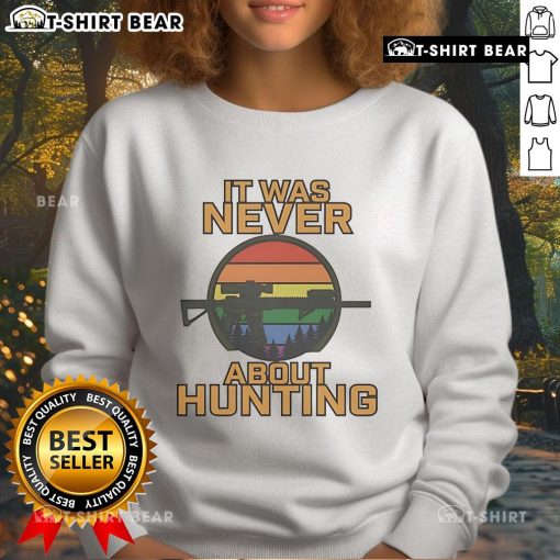 Cozy LGBT sweatshirt with 'Top It Was Never About Hunting' slogan, perfect for pride events and casual wear.