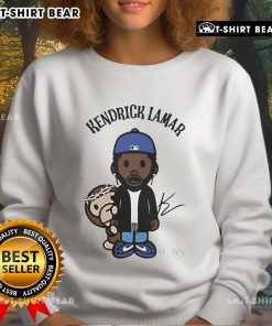 Top Kendrick Lamar wearing a colorful monkey chibi sweatshirt, showcasing a unique streetwear style.