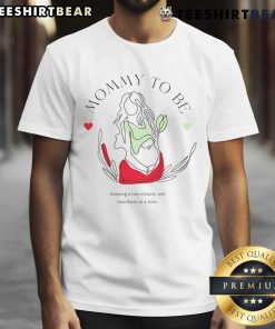 Alt Text: Top Mommy To Be Growing A Tiny Miracle T-Shirt featuring a cute baby bump design for expectant mothers.