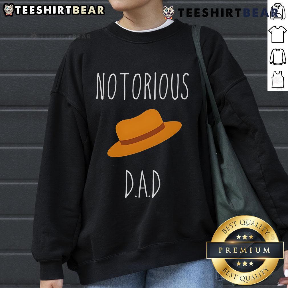 Top No Torious Dad Hat Sweatshirt Trendy Top No-Torious Dad Hat Sweatshirt displayed on a mannequin, perfect for casual wear and stylish outfits.