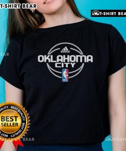 Alt Text: Oklahoma City Thunder basketball logo on a stylish ladies tee, perfect for fans of the NBA in Oklahoma City.