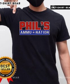 Alt Text: Top Phil's Ammu Nation GTA VI T-Shirt featuring bold graphics and vibrant colors, perfect for gamers and fans.