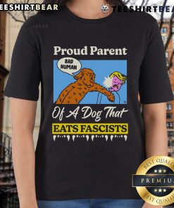 Top Proud Parent of a Dog That Eats Fascists ladies tee featuring a playful dog graphic and bold text design.