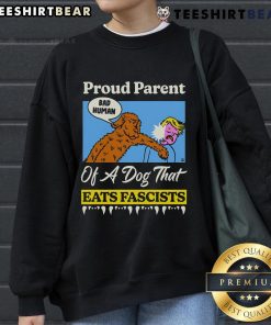 Top Proud Parent of a Dog That Eats Fascists sweatshirt featuring bold text and a playful design, perfect for dog lovers.