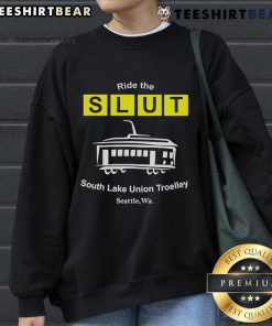 Cozy sweatshirt featuring 'Top Ride the SLUT' design, perfect for fans of the South Lake Union Trolley in Seattle, WA.