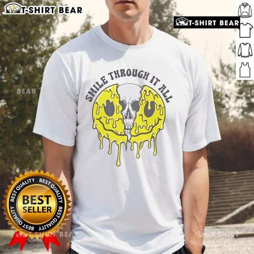 Top Skull Smile Through It All T-Shirt featuring a bold skull graphic and inspirational text for a unique style.