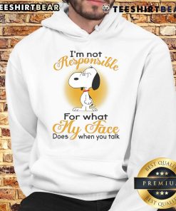Alt Text: Cozy hoodie featuring Snoopy and the phrase I'm not responsible for what my face does when you talk, perfect for fans.