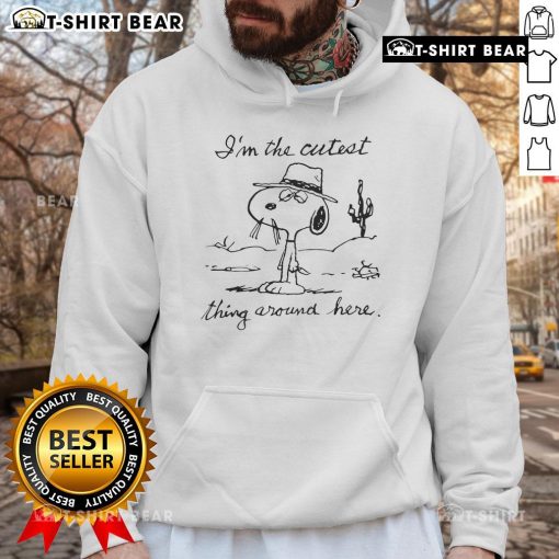 Adorable Snoopy hoodie featuring 'I'm the cutest thing around here' design, perfect for casual wear and dog lovers.