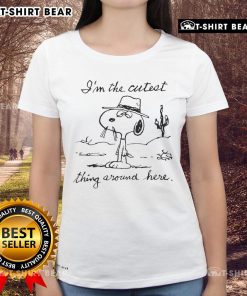 Cute ladies tee featuring Snoopy with the phrase 'I'm the cutest thing around here' for fun casual wear.