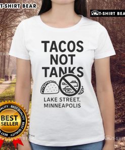 Top Tacos Not Tanks Lake Street Minneapolis Ladies Tee featuring vibrant taco graphic on a stylish women's shirt.