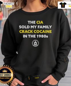 Top The CIA Sold My Family Crack Cocaine in the 1980s sweatshirt featuring bold graphic design and vibrant colors.