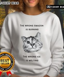 Top-The-Wrong-Amazon-Is-Burning sweatshirt featuring bold text and vibrant graphics highlighting climate change issues.