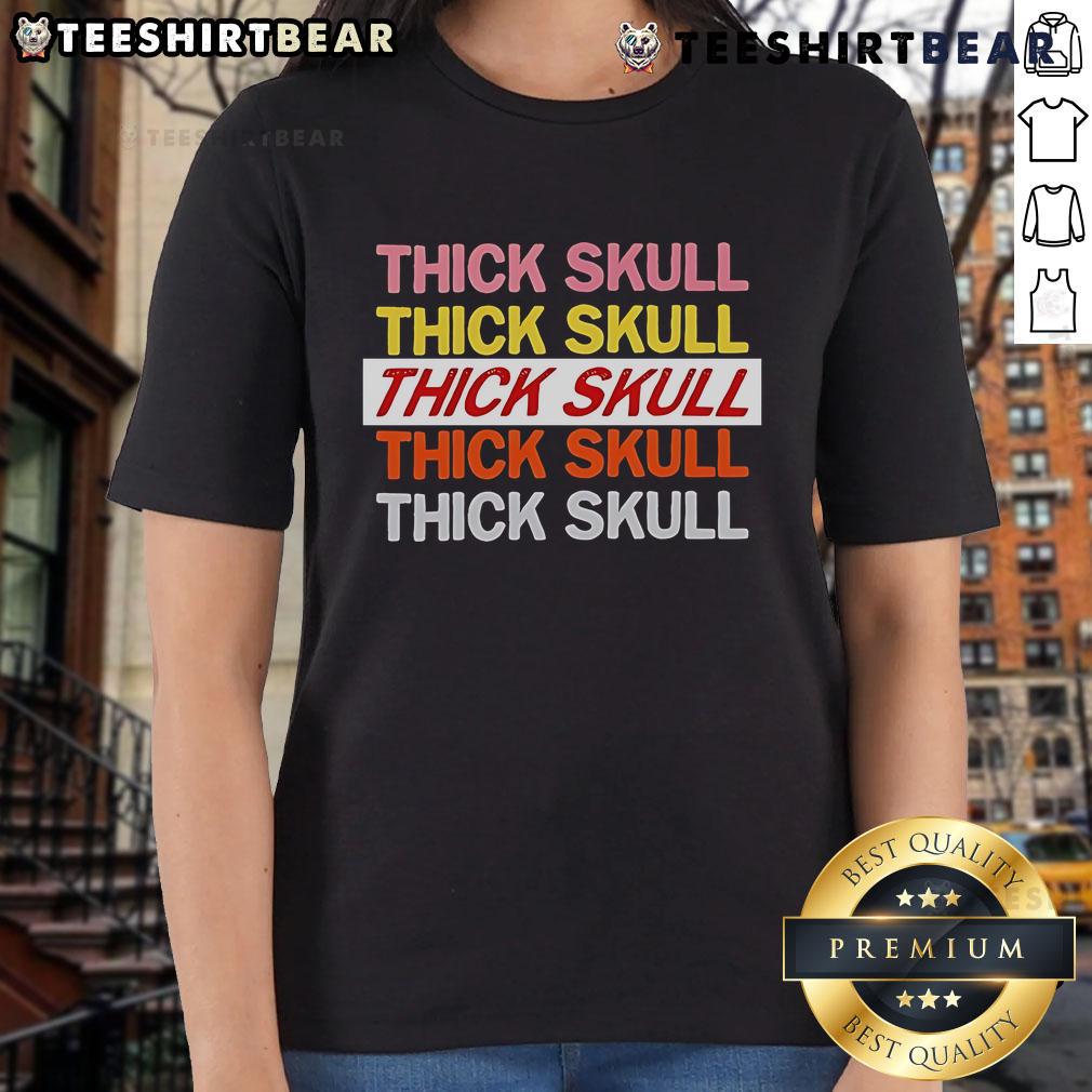 Top Thick Skull Raglan Ladies Tee Top Thick Skull Raglan Ladies Tee featuring a stylish skull graphic on a comfortable, casual fit.
