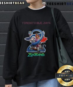 Alt Text: Top Toronto Blue Jays Zootopia 2 Sweatshirt featuring vibrant colors and a trendy design for fans.
