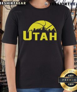 Stylish 2025 Ladies Tee featuring the vibrant skyline of Utah Jazz cityscape, perfect for fans and fashion lovers.