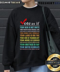 Top Vote sweatshirt featuring 'As If Your Skin Is Not White' design, advocating for equitable medical care for all.