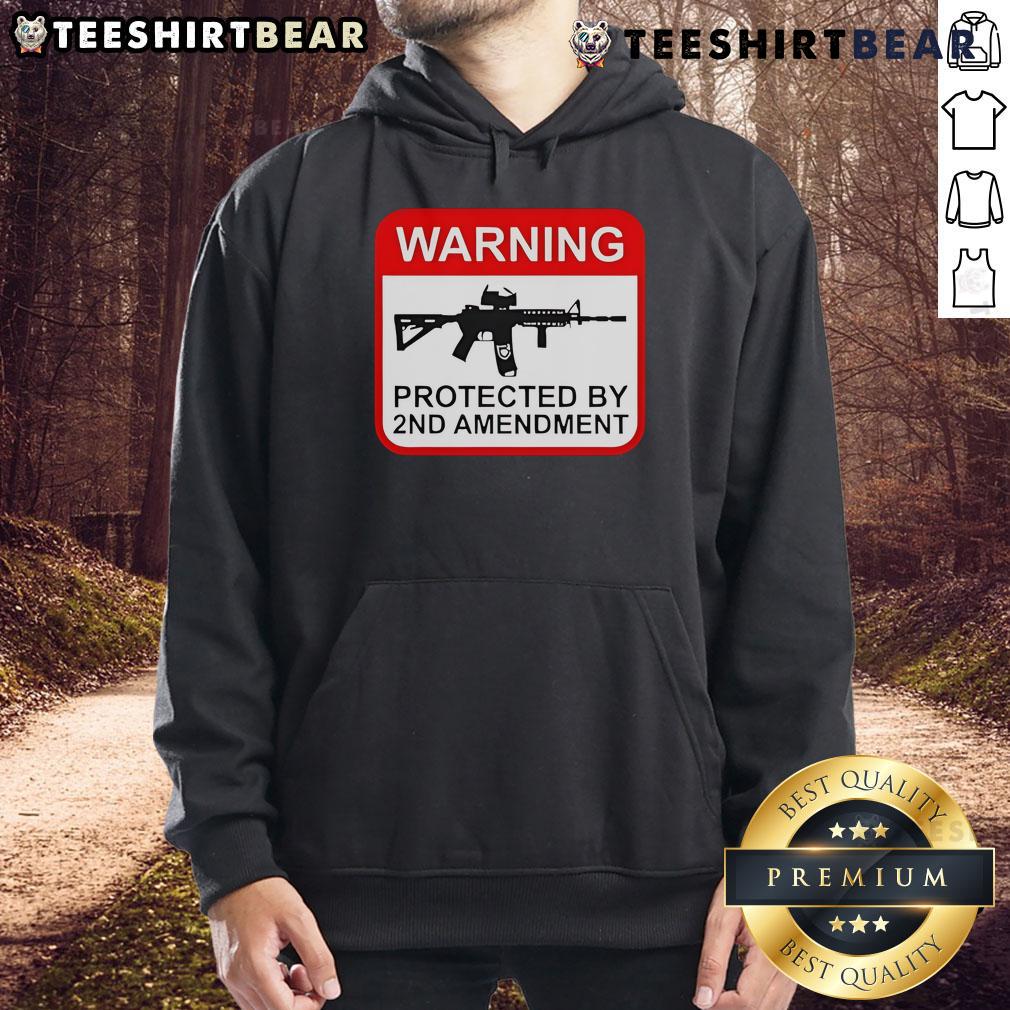 Top Warning Protected By 2Nd Amendment Hoodie Top Warning Protected By 2nd Amendment Hoodie featuring a bold graphic design advocating for gun rights and freedom.