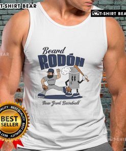 Alt Text: Carlos Rodon in a New York Yankees tank top, showcasing his beard during mid-summer baseball season.