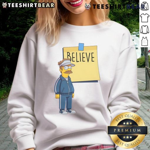 Alt Text: Awesome Coach Ned Flanders Believe The Simpsons sweatshirt featuring vibrant colors and iconic character design.