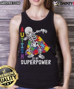 Awesome dabbing skeleton in autism awareness puzzle cape on a tank top, celebrating individuality and superpowers.