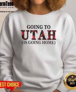 Cozy 'Awesome Going to Utah is Going Home' sweatshirt displayed on a wooden table, perfect for travel enthusiasts.