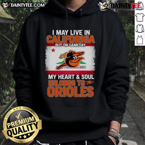 Person wearing an Orioles hoodie, showcasing team spirit on game day while living in California.