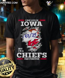 Awesome t-shirt featuring 'I May Live In Iowa But Im A Kansas City Chiefs Fan Forever' design, perfect for Chiefs fans.