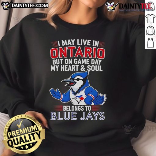 Cozy Toronto Blue Jays sweatshirt featuring 'I May Live In Ontario But On Game Day My Heart Belongs To The Blue Jays' design.
