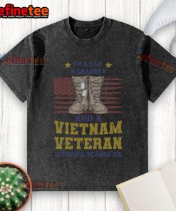 Alt Text: Awesome I'm a Dad, a Grandpa, and a Vietnam Veteran Nothing Scares Me washed t-shirt displayed on a wooden background.