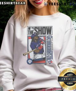 Alt Text: Awesome MLB The Show Blue Jays Vladimir Guerrero Jr. sweatshirt featuring vibrant team colors and logo.