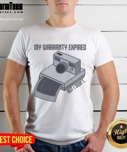 Alt Text: Vintage instant camera t-shirt featuring the phrase My Warranty Expired But I Didnt in a fun design.