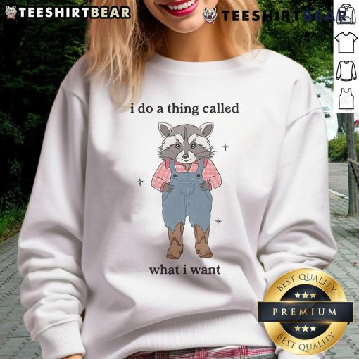 Awesome raccoon sweatshirt with 'I Do A Thing Called What I Want' design, perfect for animal lovers and casual wear.