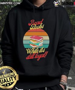 Vintage sunset hoodie with 'Awesome Read Books While It's Still Legal' print, perfect for book lovers and cozy evenings.