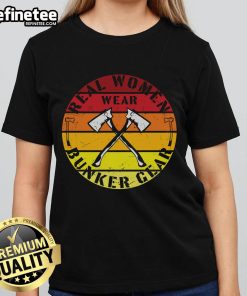 Real women in vintage Bunker gear with axes at sunset, showcasing the Awesome Real Women Wear Bunker Gear tee.