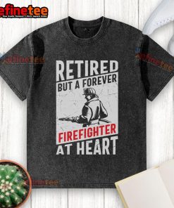 Awesome retired but a forever firefighter at heart washed t-shirt displayed on a rustic wooden background.