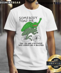 Awesome T-shirt featuring 'Somebody Toad Me You Had A Boyfriend Who Looked Like A Bullfrog' design for frog lovers.